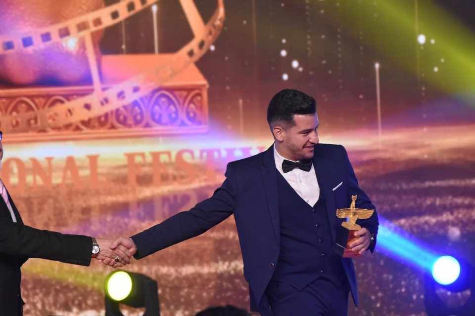 received_12214505566949533814428082027443420 الأديب والباحث الجزائري عمراني عبد العزيز يتوَّج بالجائزة الأولى في مهرجان همسة الدولي عن روايته "بين القاع والضياع"